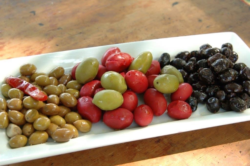 Fortuna’s Sausage offers olives in vivid hues. Press photo courtesy of Patti Fortuna