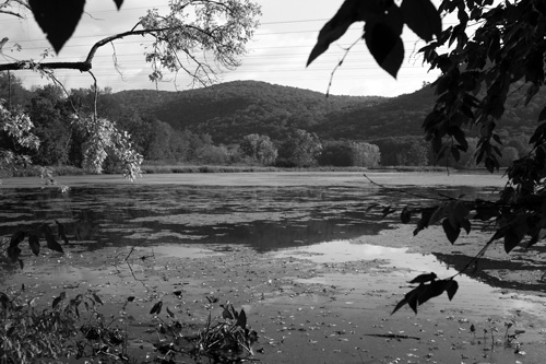 Woods Pond in Lenox, Mass., is among the stretches of the Housatonic River most heavily contaminated with PCBs. Dredging to remove the pollution wouldn’t be completed until 2029 under a cleanup plan released last month by the U.S. Environmental Protection Agency.