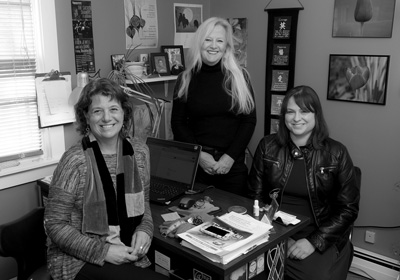 photo by George Bouret: At the Sunrise Family Resource Center in Bennington, Denise Main, Amelia Silver and Lindsay Errichetto all use techniques from yoga and meditation in their work.