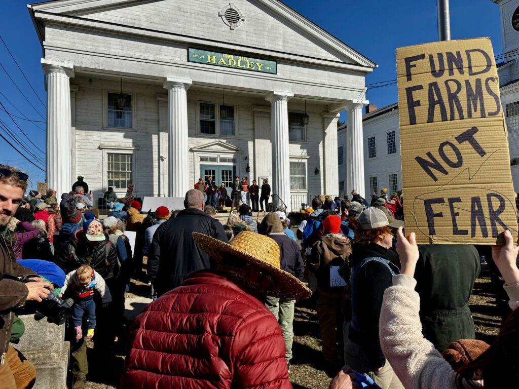 Western Massachusetts locals gather in support of farmers as the federal administration cuts funding. Press photo courtesy of Roots Rising